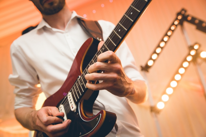 Guitarist Soloing at Party London