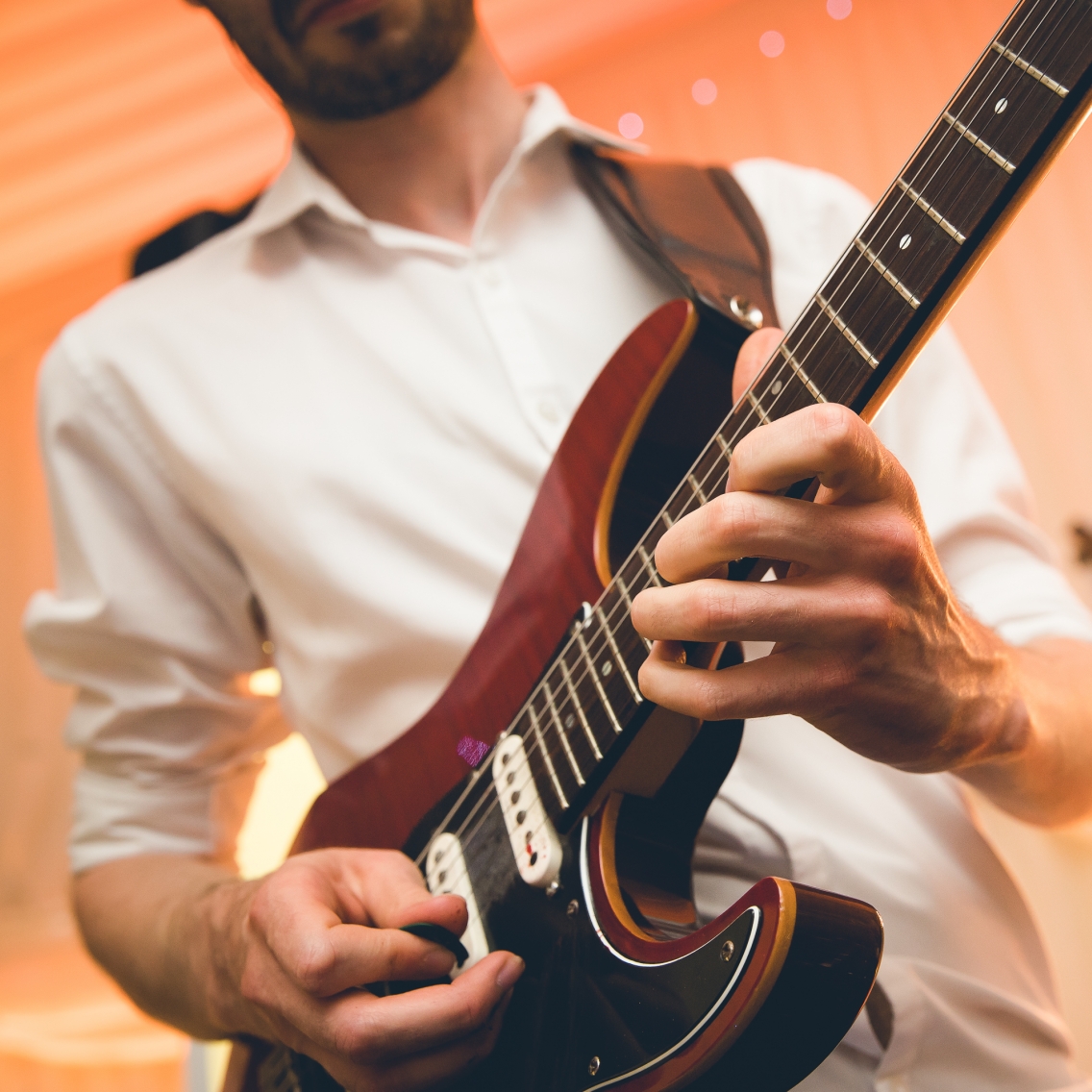 Guitarist Soloing at Party London